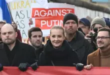 Photo of «Мы все еще представляем Россию». Кто и зачем вышел на марш оппозиции в Берлине